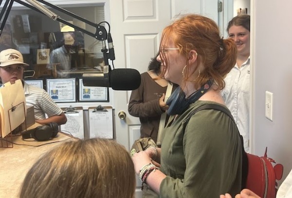 Female 4-H'er recording radio ad